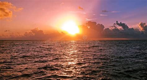 Early Morning Over The Caribbean Sea Sunrise And Clouds Stock Photo