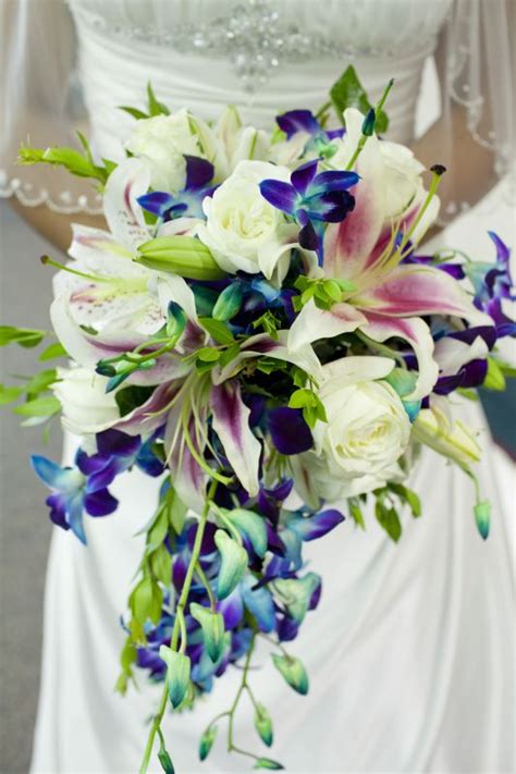 If yours is a winter themed wedding and you're using blue colors do consider. My Blue Orchids bouquet!!!! | Weddingbee Photo Gallery