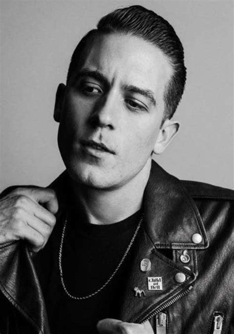 One side is blended and the other is blended but with an undercut as the top hangs over. G Eazy Haircut - Men's Hairstyles & Haircuts Swag