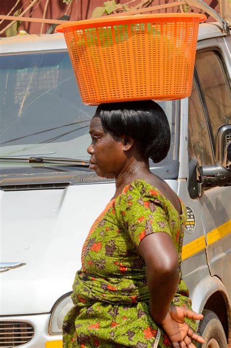 unidentified ghanaian woman carries a basket on her head in loc editorial photo image of black