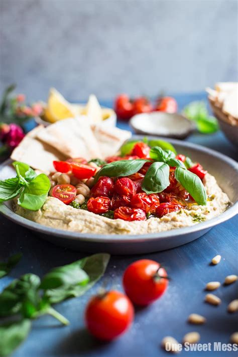 Can cats eat basil and what will happen if your feline friend takes a nib out of this plant that's often used as a spice by humans? Pesto Hummus with Roasted Cherry Tomatoes - One Sweet Mess