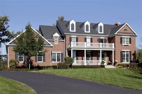 Beautiful Two Story Brick Home With Plenty Of White Mortar Giving It A