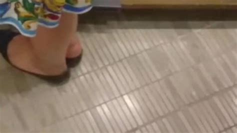 Sexy Asian Girl Shoeplay At Bookstore