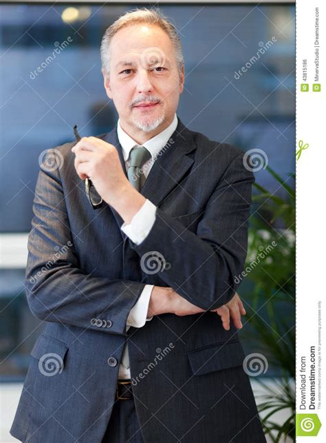 Mature Businessman Holding His Glasses Stock Photo Image Of People Work