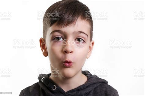 Studio Portrait Cute Boy Whistling Stock Photo Download Image Now