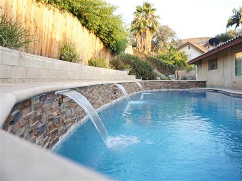 Click to see our portfolio of images. Swimming Pool Walls & Waterfalls | Trinity Custom Pools