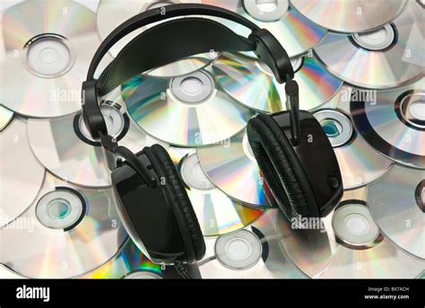 Black Headphones And Lots Of Cds Stock Photo Alamy