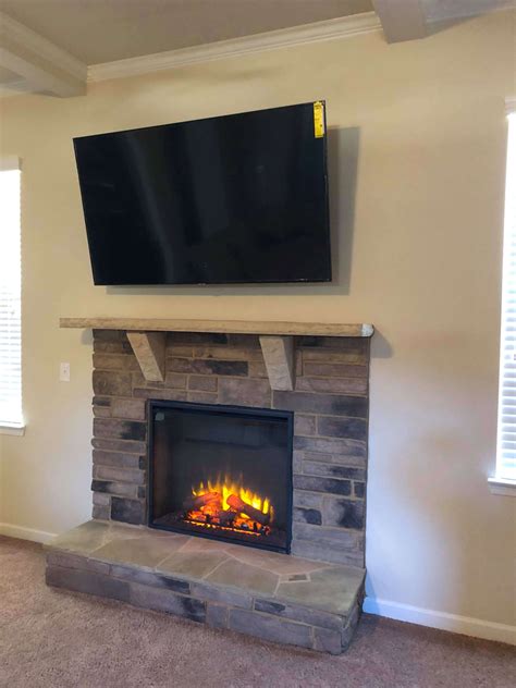 70 Inch Tv Above A Fireplace In Sandy Springs Ga Tv Mounting Service