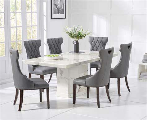 Carvelle 200cm White Pedestal Marble Dining Table With Freya Chairs