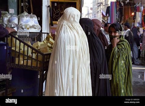 Pakistan Peshawar Afghan Women In Burkas At The Market Stock Photo Alamy