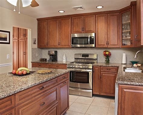 Dark gray kitchen cabinets also match the cabinets on the island and complement the look on the kitchen. What Paint Colors Look Best With Cherry Cabinets?