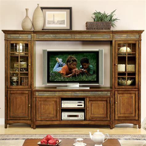 Fusing fashion with function, this tv stand is the ultimate focal point for your living room look or den ensemble. Riverside Craftsman Home Entertainment Center - Americana Oak at Hayneedle