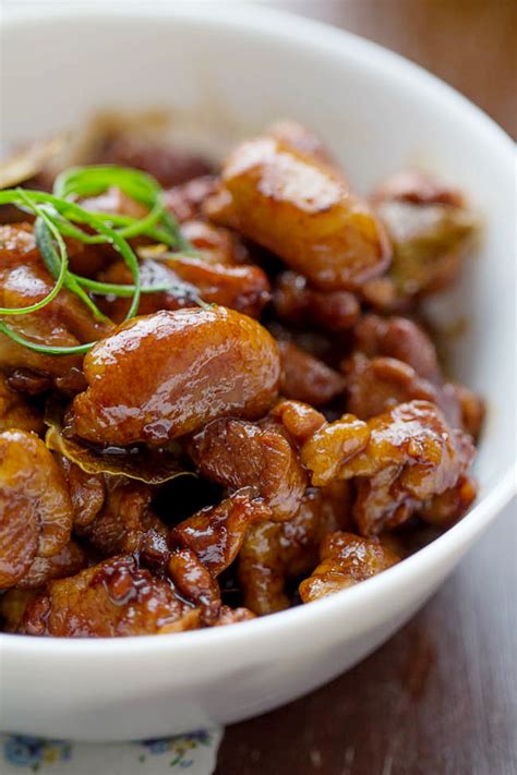 In this version, chicken is marinated in vinegar and soy sauce, then slowly cooked with garlic and spices. Filipino Chicken Adobo - China Sichuan Food