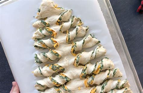Take the two outside triangles you cut off and press dough together. Christmas tree spinach dip breadsticks - It's Always ...