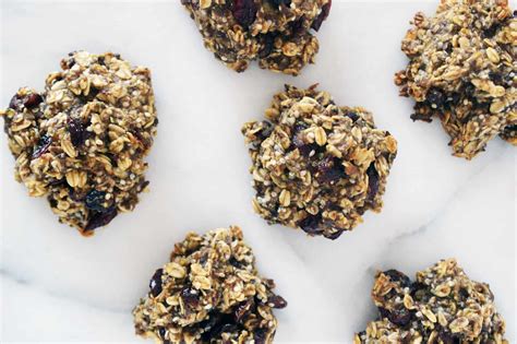Oat flour, oats, baking powder, salt, cinnamon, chia seeds, honey, dried blueberries, pumpkin seeds, and more. Superfood Breakfast Cookies - AndiAnne