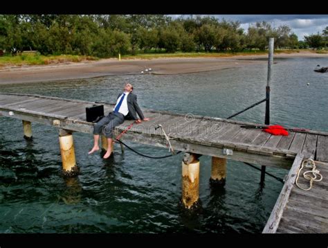 Sitting On The Dock Of The Bay Stock Photo Image Of Foot Angler 4767408