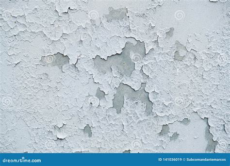 Fragment Of An Old Concrete Wall Covered With White Peeling Paint Stock