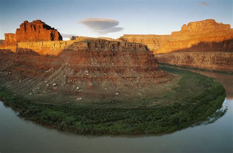 Landscape Photography Of Rock Formation Surrounded By River During