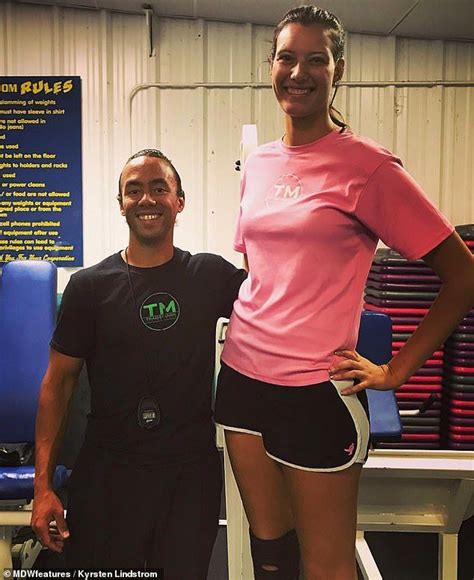 21 Year Old Kyrsten Lindstrom Stands Six Foot Seven Tall With Five Foot Seven Friend Tall