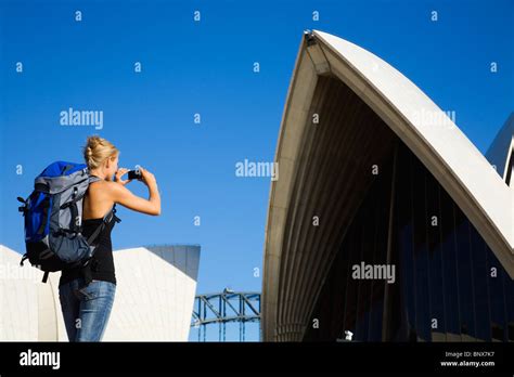A Backpacker Photographs The Opera House In Sydney New South Wales