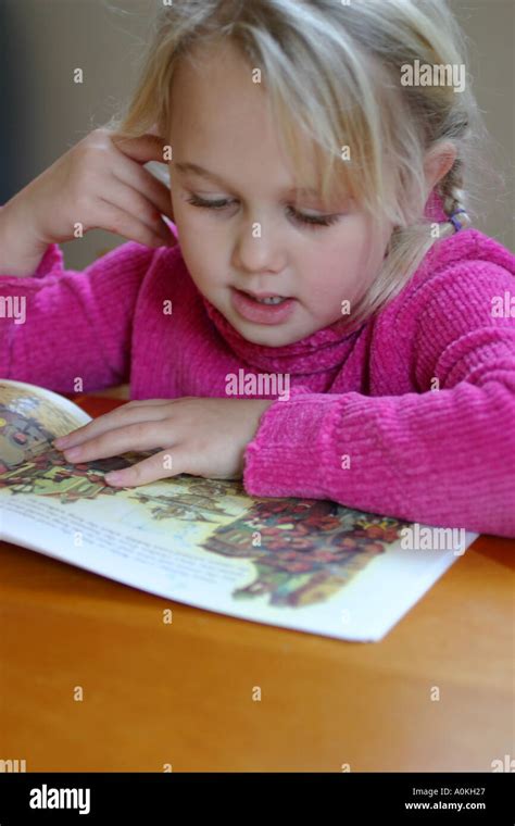 Girl Reading At Home 5 Stock Photo Alamy