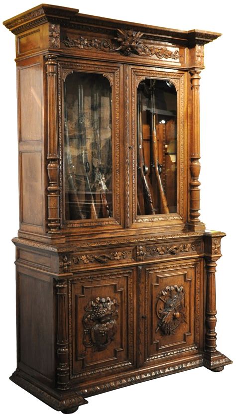 If you're an avid gun collector, there's no better way to store and display your gun collection than with a beautifully handcrafted solid wood gun cabinet. 19th C. Carved Gun Cabinet from Normandy at 1stdibs