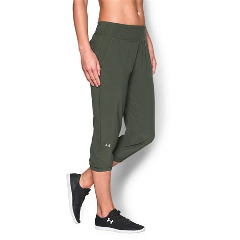 under armour women s ua heatgear® sunblock 50 pants in green lyst