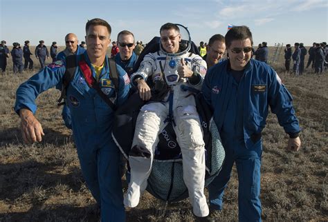 Space Station Crew Touches Down Nasa Astronaut And Russian Cosmonauts
