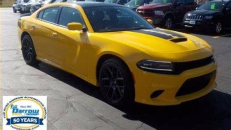 Yellow Dodge Charger With Racing Stripes Stolen From Showroom Floor At