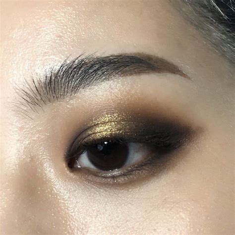 Gold and black eye makeup gold glitter dramatic cut crease makeup tutorial black with pink. black & gold winged halo eye CCW : MakeupAddiction | Black and gold eyeshadow, Gold eye makeup ...