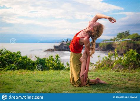 Outdoor Yoga Practice Young Woman Practicing Variation Of Ushtrasana