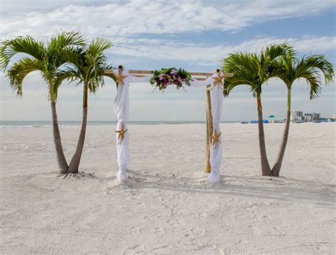 Our Bamboo Arch With Fabric Flowers And Starfish Wedding Arch