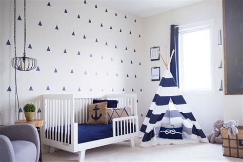 Retire to an elegantly decorated guest room, equipped with modern amenities for both work and relaxation and featuring fabulous views of the lake. Baby boy nursery room design - westofmaindesign