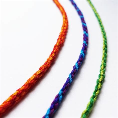Learn to make your own colorful bracelets of threads or yarn. 4, 6, and 8 Strand Round Braids, Without a Kumihimo Disk - How Did You Make This? | Luxe DIY