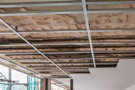 Beam systems are also available, in which tiles are laid between parallel beams rather than a grid, and there are a. Knauf Extends Ceiling Offering To Customers - Plasterers News
