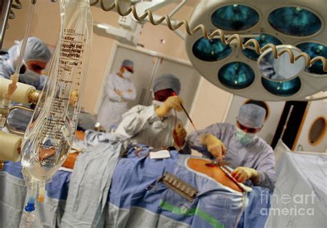 Surgeons Perform Quadruple Bypass Heart Operation Photograph By Michael