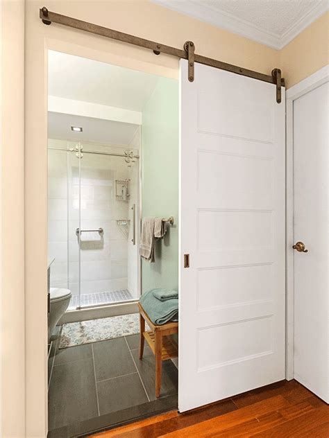 A sliding barn door is always a good idea. Small Bathroom Ideas - Bob Vila