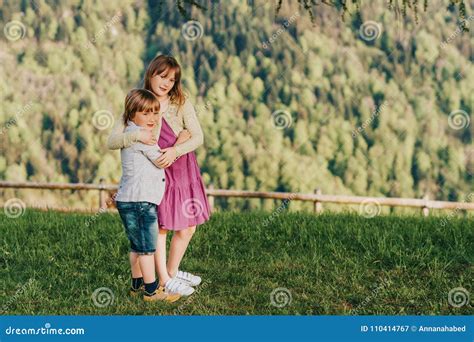 Little Boy And Girl Resting In Mountains Stock Image Image Of