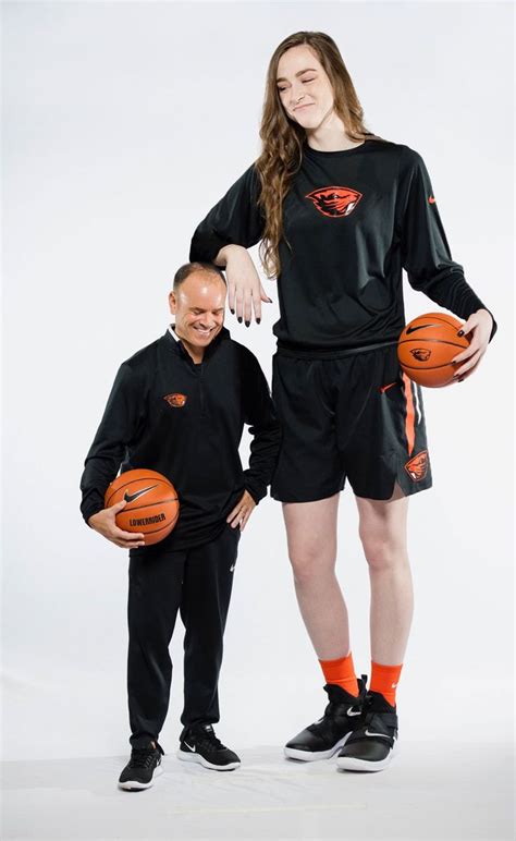 Tall College Basketball Player With Tiny Coach By Lowerrider On Deviantart College Basketball