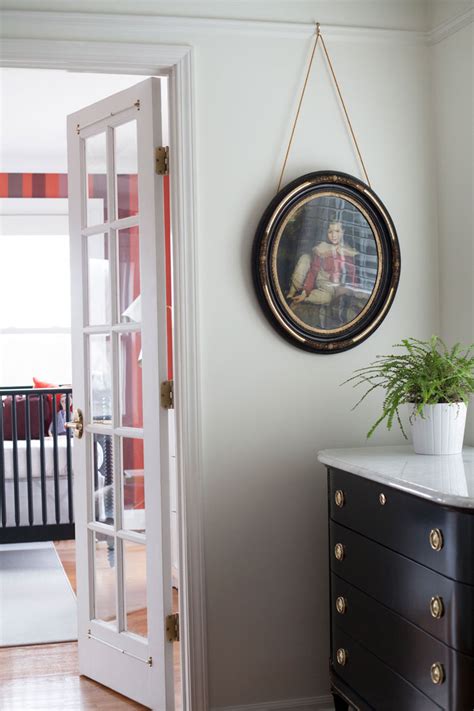 The clock was ticking on a friday night and i needed a fast solution to cover up dents and dings in my dining room wall 3. How to Hang Art From Picture Rail - The Makerista