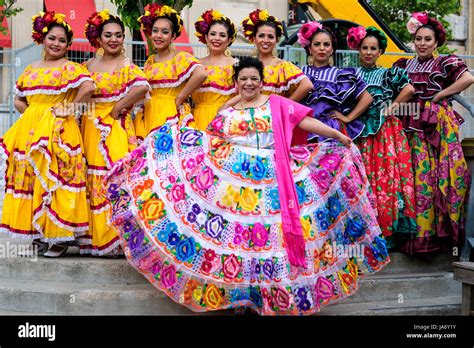 Group Of Mexican Female Folk Dancers Wearing Mexican Traditional Stock