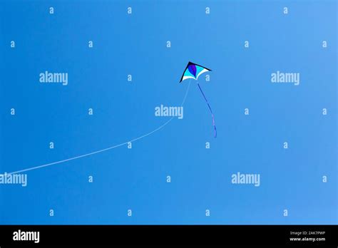 Kite Flying High In The Sky Stock Photo Alamy