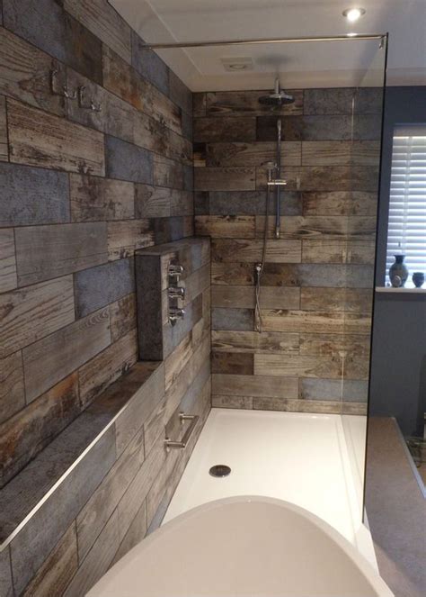 A cozy rustic meets contemporary bathroom with a large vanity, a whitewashed wooden floor and a round mirror (gmt home designs inc.) a modern rustic bathroom with much wood, tiles on the floor and a fun cow print bathtub (pscbath). 15 Stylish Ways To Add Rustic Touches To Your Bathroom ...