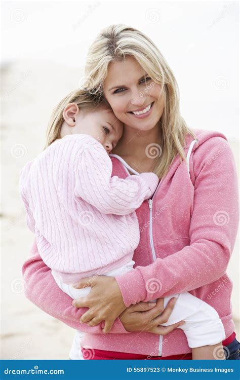 Mother Cuddling Young Daughter Outdoorsoutside Stock Image Image Of Sweater Love 55897523
