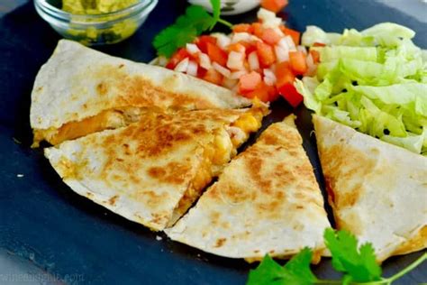 When the tortilla is golden on the first side, carefully flip the quesadilla to the other side, adding another 1/2 tablespoon butter to the skillet at the. Taco Bell Chicken Quesadilla - Wine & Glue