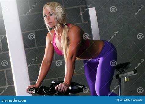 Woman At The Gym On A Bike Stock Image Image Of Machine