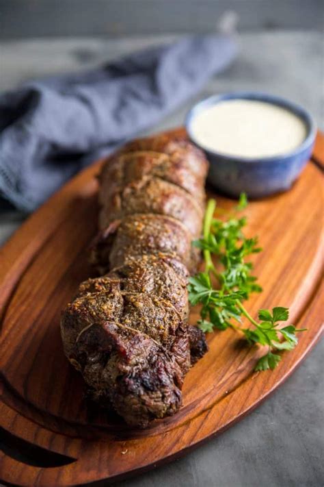 The allure of beef tenderloin pulls hard when properly cooked until the surface is seared to a glistening mahogany and the center is tender and running season the tenderloin all over with the salt, pepper, rosemary and garlic. How To Cook Beef Tenderloin - LemonsforLulu.com