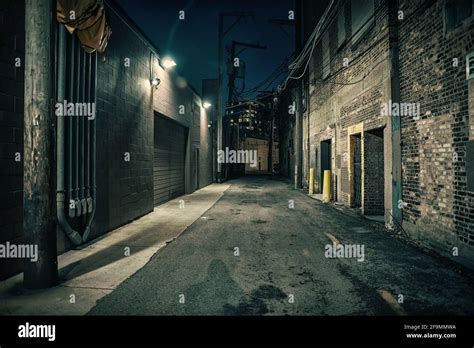 Dark And Eerie Urban City Alley At Night Stock Photo Alamy