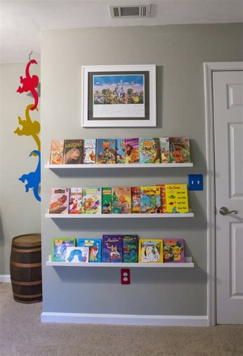 Cat shaped kids room walls shelves is nice choice because there is no child that doesn't love cats and dogs. kids-bookshelves-design-with-storage-system | HomeMydesign