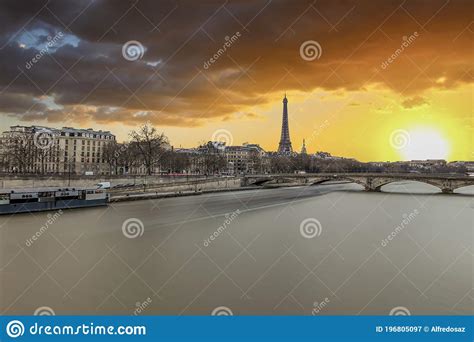 Long Exposure Photography Of Sunset In Paris In A Cloudy Day With